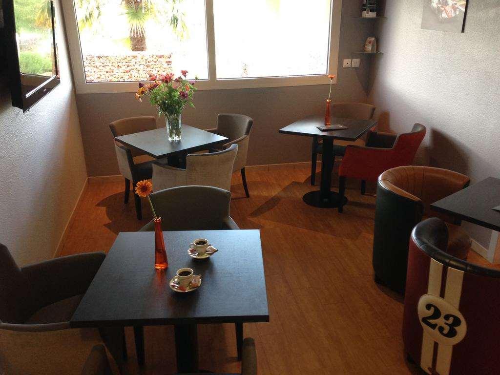 סן-סטורנה Brit Hotel Les Evens מסעדה תמונה